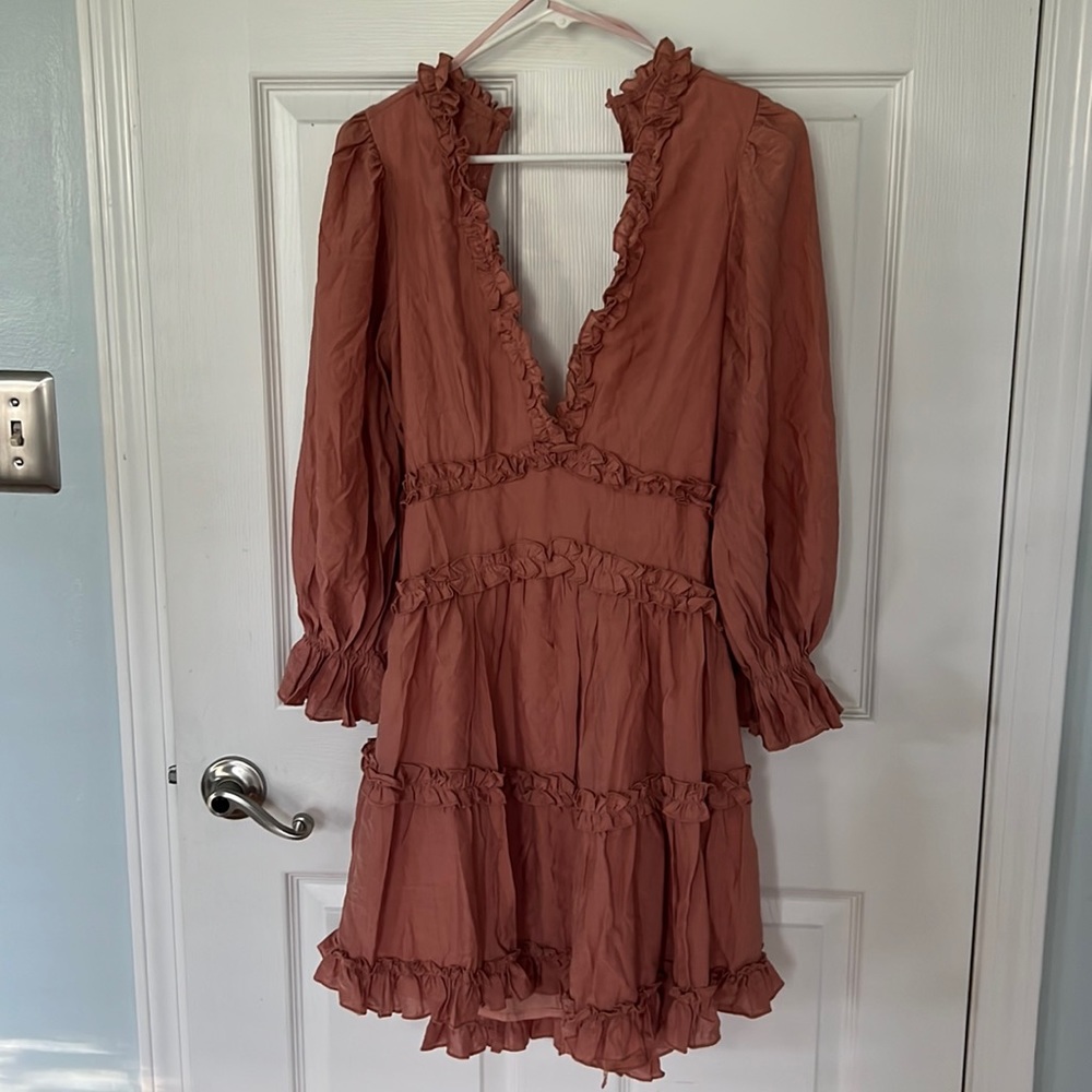 Mauve v-neck dress with ruffle detail